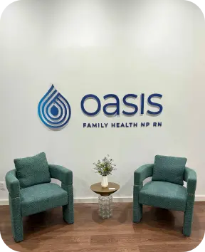 Oasis Family Health reception area with branded wall
