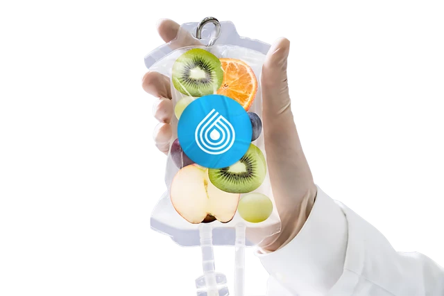 Hand holding an Oasis Family Health IV drip bag